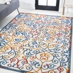 Atrani Scroll Cream/Blue/Red 4 ft. x 6 ft. Trellis Indoor/Outdoor Area Rug by JONATHAN Y