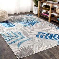 Tropics Palm Leaves Gray/Blue Indoor/Outdoor 8 ft. x 10 ft. Area Rug by JONATHAN Y